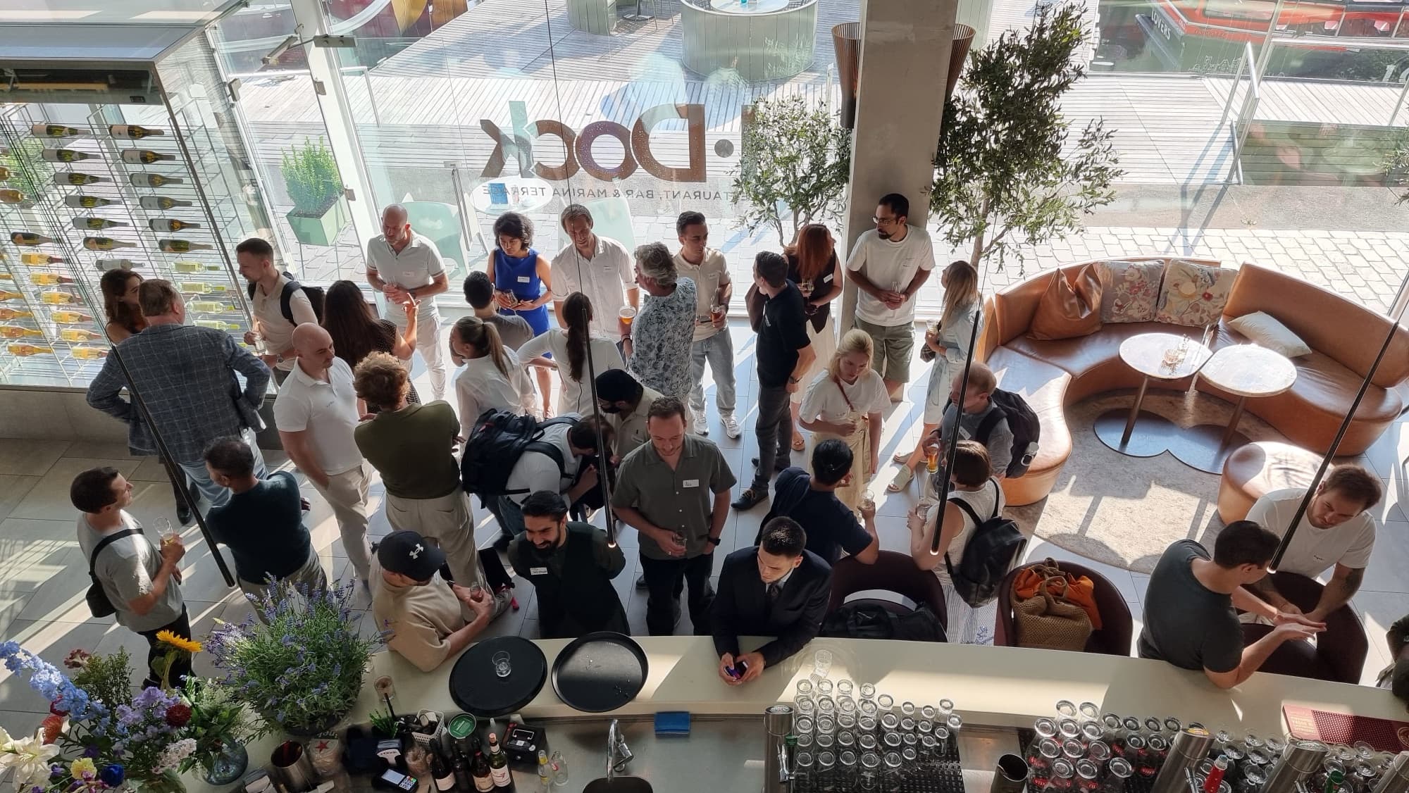 The crowd at the I Dock bar during a Startup Valley startup event in Amsterdam, seen from the mezzanine
