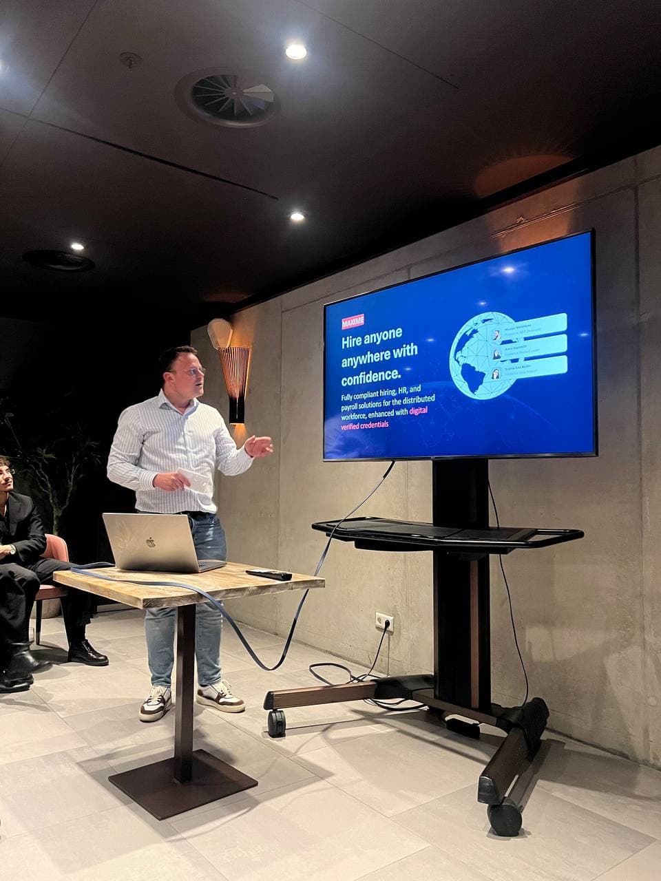 Founder pitching on stage at a Startup Valley pitch night in Amsterdam